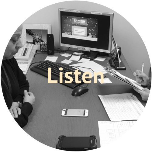 Listen: a testing session at a table with the device and notes.